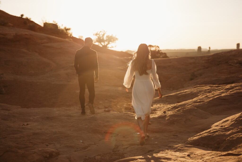 engagement session couple walking through Zion nation park